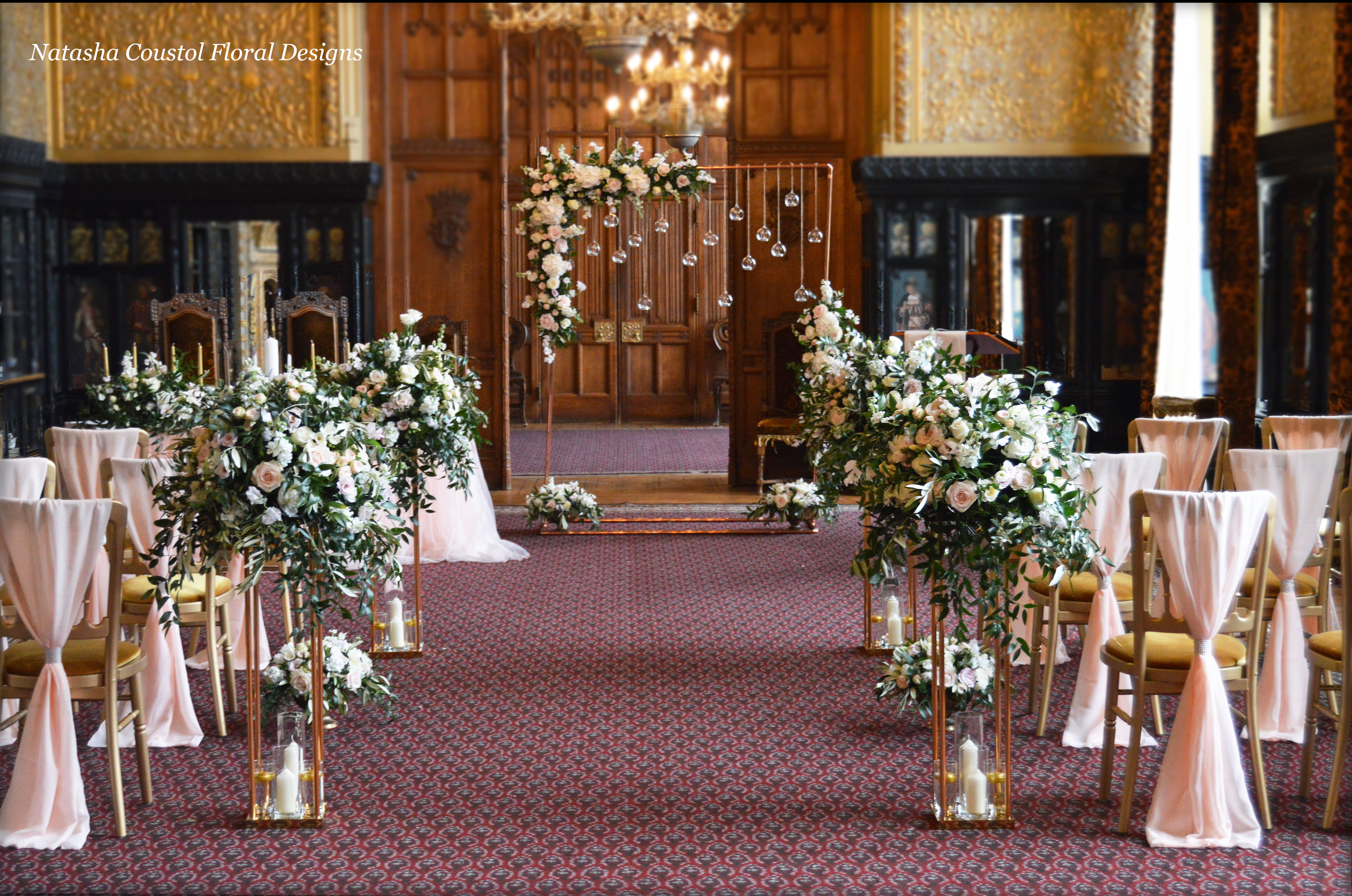 wedding-carlton-towers-ceremony-copper-arch-gold-stands-flowers-copy Grid No Space 5 Columns